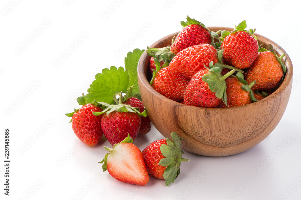 A bowl of beautiful strawberries isolated on white background with clipping path, close up, macro. A bowl of beautiful strawberries isolated on white background with clipping path, close up, macro.