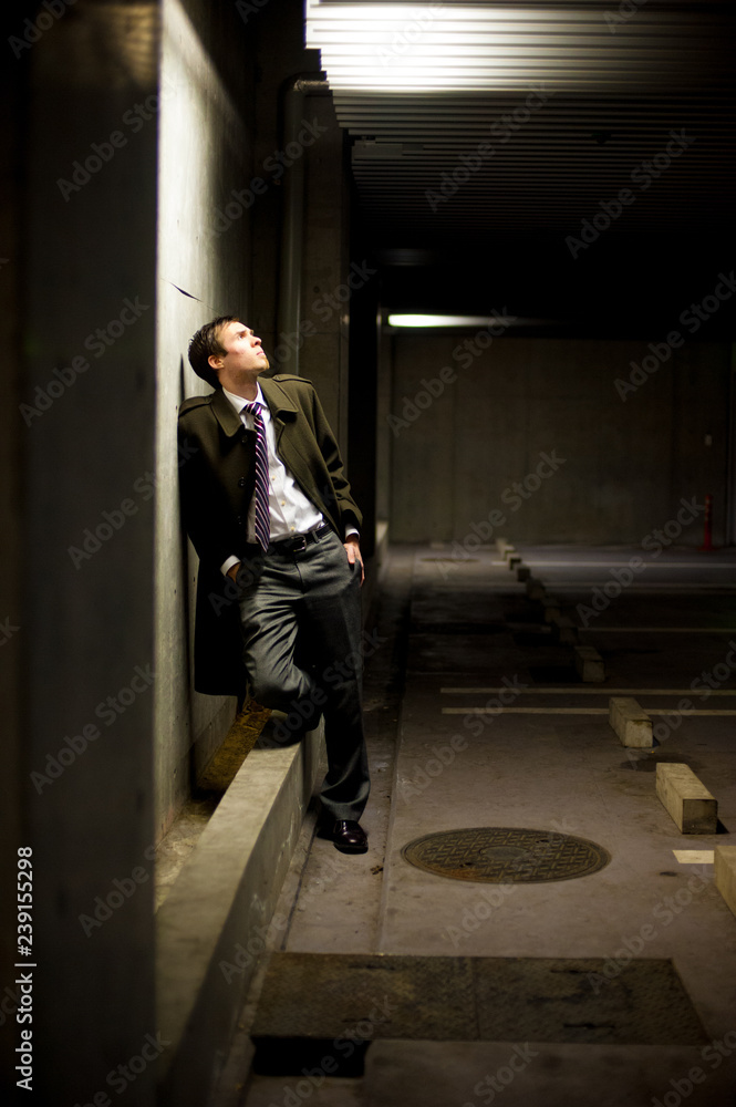 Caucasian male model poses for pictures on the street Caucasian male model poses for pictures on the street