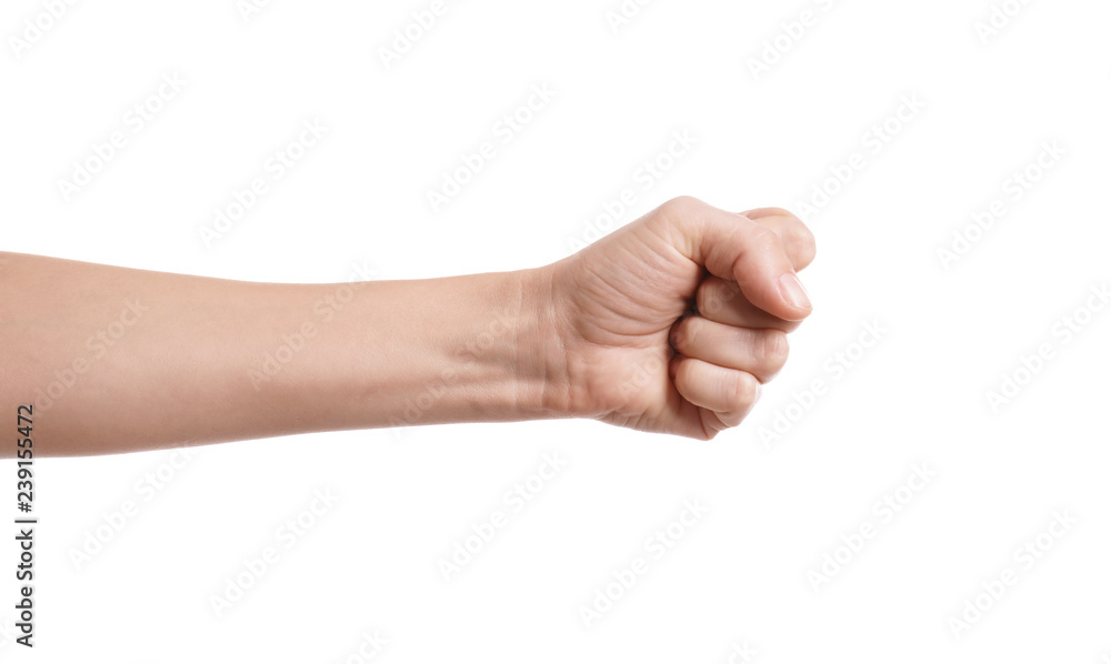 Woman showing fist on white background, closeup of hand Woman showing fist on white background, closeup of hand