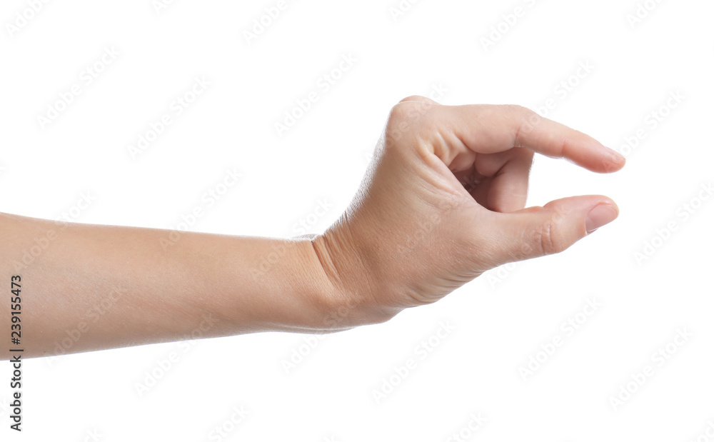 Woman holding something in hand on white background, closeup Woman holding something in hand on white background, closeup