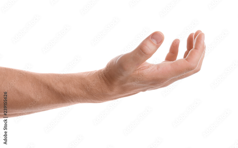 Man holding something in hand on white background, closeup Man holding something in hand on white background, closeup