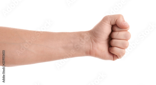 Man showing fist on white background, closeup of hand