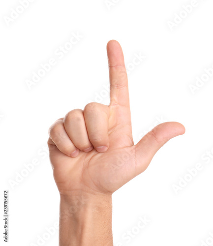 Man pointing at something on white background, closeup of hand