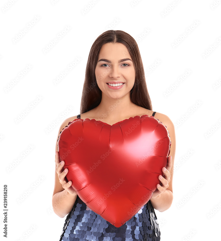 Portrait of young woman with heart shaped balloon on white background Portrait of young woman with heart shaped balloon on white background