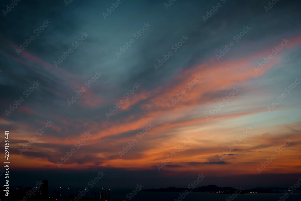 beautiful sky sunset with colorful cloud at beach ocean