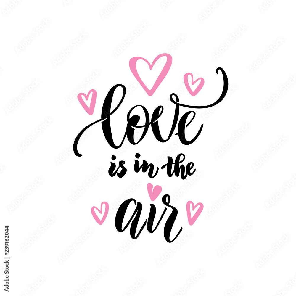 Love couple, wedding, valentines day concept. Love is in the air hand lettering calligraphy text isolated. Greeting card
