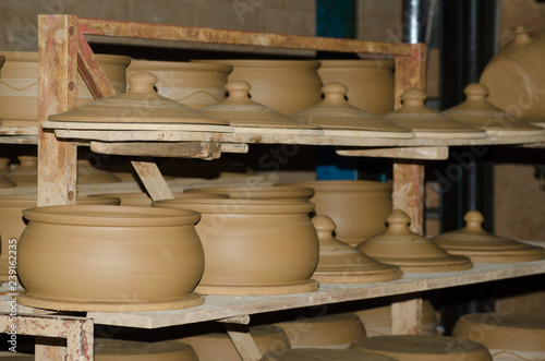 Pottery studio shelves storage clay cookware 