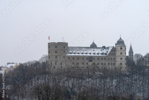 Die Wewelsburg bei Paderborn im Winter während eines Schneesturms photo