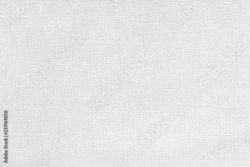 White background from a textile material. Fabric with natural texture. Backdrop.