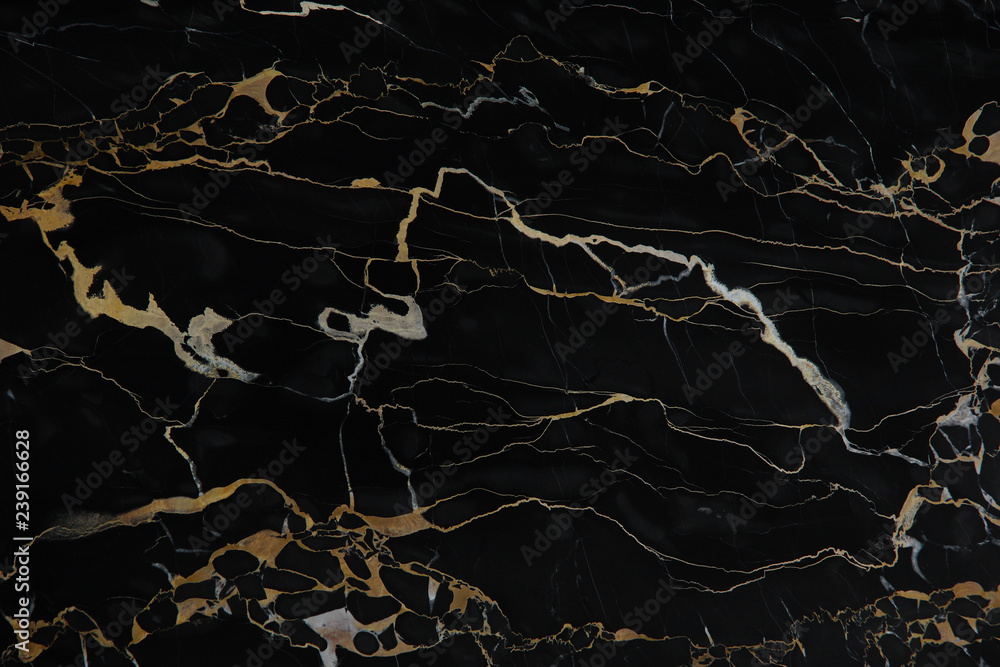 Yellow veins on black polished natural marble Nero Portoro Yellow veins on black polished natural marble Nero Portoro