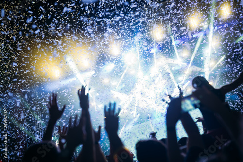 Portrait of happy crowd enjoying at music festival