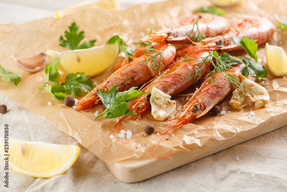 Grilled shrimps with spice, garlic and lemon. Grilled seafood. Grilled shrimps with spice, garlic and lemon. Grilled seafood.