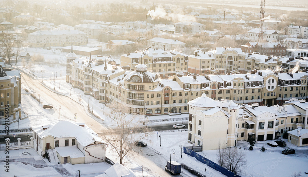 Fototapeta premium winter cityscape, view from the top of the house