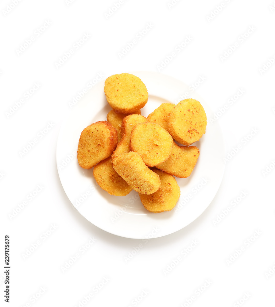Fried chicken nuggets on white background. Тop view. Fried chicken nuggets on white background. Тop view.