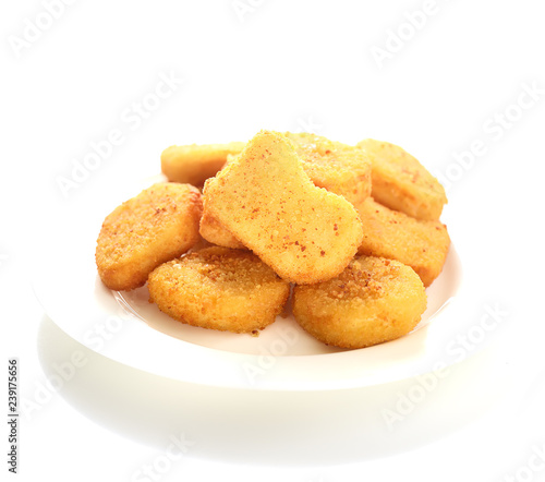 Fried chicken nuggets on white background.