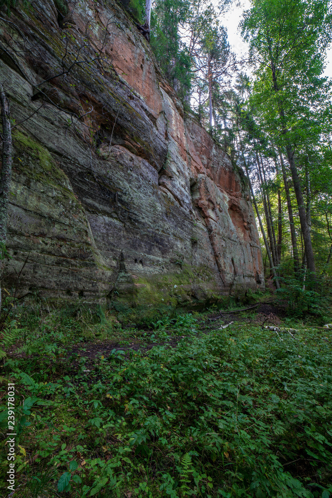 sandstone cliffs with tourist trail on river of gauja, Latvia sandstone cliffs with tourist trail on river of gauja, Latvia