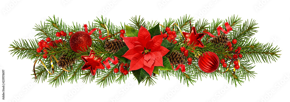 Evergreen twigs of Christmas tree and decorations in a festive garland Evergreen twigs of Christmas tree and decorations in a festive garland