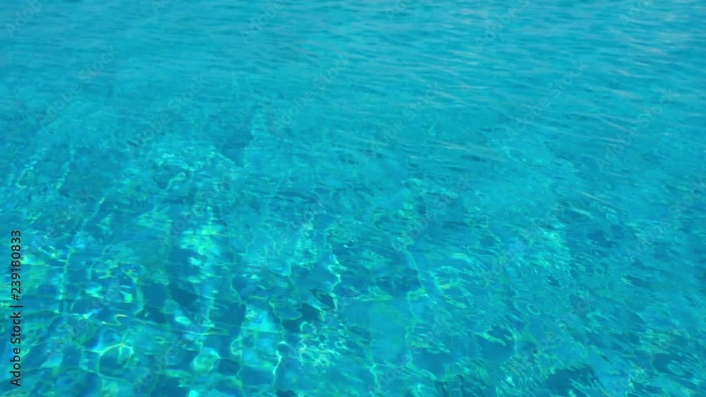 4k Slow motion. light reflections of Pure blue water in the pool
4k Slow motion. light reflections of Pure blue water in the pool