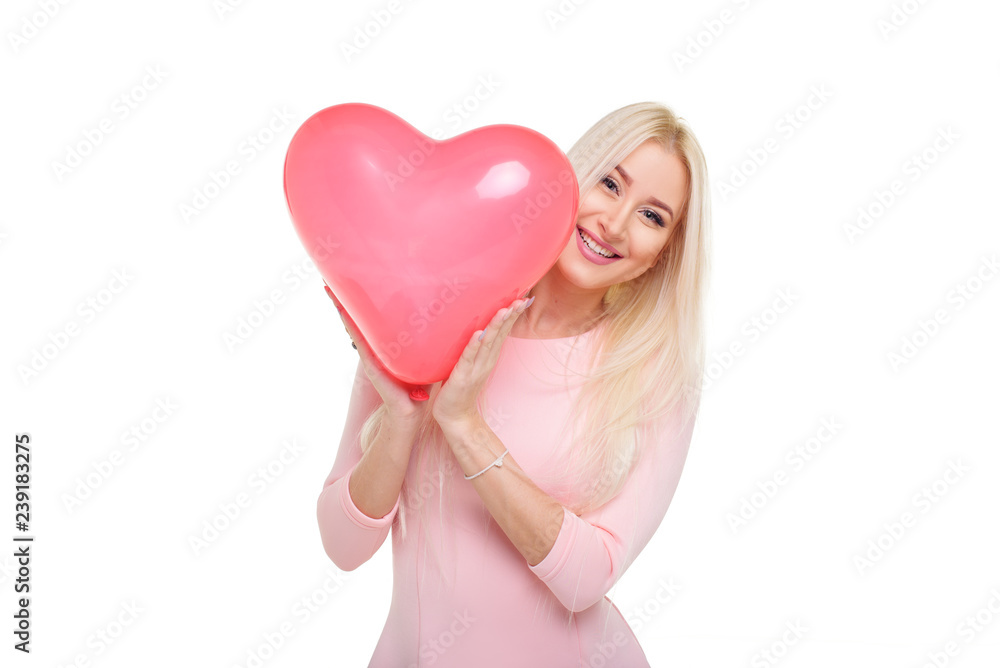 Beautiful young blond woman with heart shape pink air balloon on white isolated background. Woman on Valentine's Day. Symbol of love - Image Beautiful young blond woman with heart shape pink air balloon on white isolated background. Woman on Valentine's Day. Symbol of love - Image