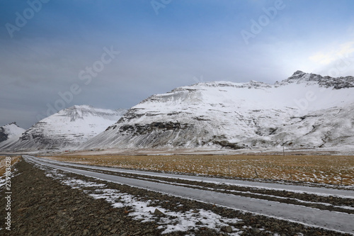 Highway leading to a snowy mountain