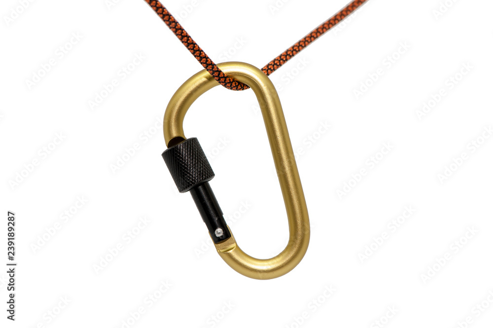 The carbine hanging on a lace is isolated on a white . The carbine hanging on a lace is isolated on a white .