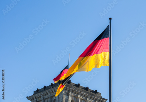 Federal Flag of Germany on Reistag - the parliament building in Berlin. Government quarter. Tourist attraction. Fragments. Close-up. Famous place. The capital of the European city.