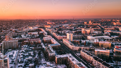 Beautiful sunset on the background of a European city with a copter. Gomel. Belarus. photo