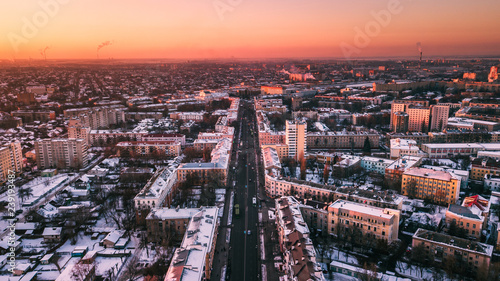 Beautiful sunset on the background of a European city with a copter. Gomel. Belarus. photo