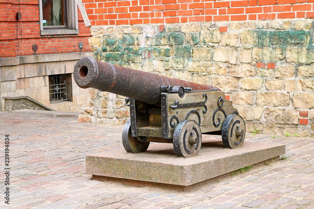 Old massive iron cannon in the Old town of Riga, Latvia