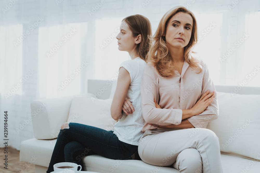 Woman Comforts Unhappy Teenage Daughter at Home. Woman Comforts Unhappy Teenage Daughter at Home.