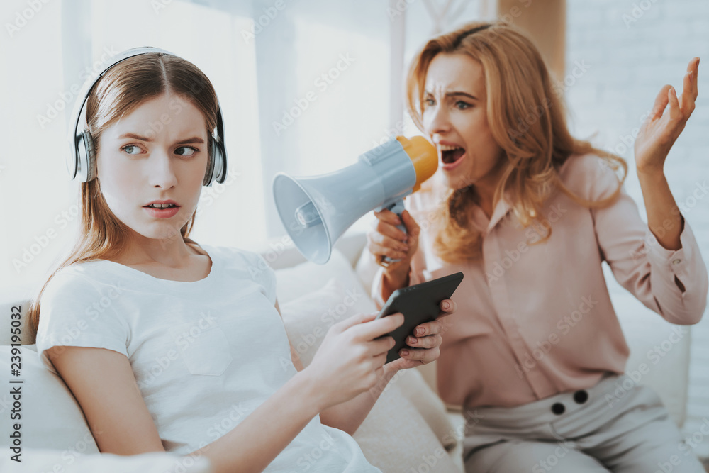 Quarrel between Mother and Daughter in White Room. Quarrel between Mother and Daughter in White Room.