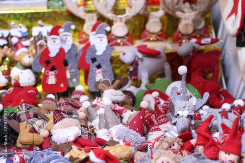 Assortment of toy decoration for the Christmas tree in baskets in store.