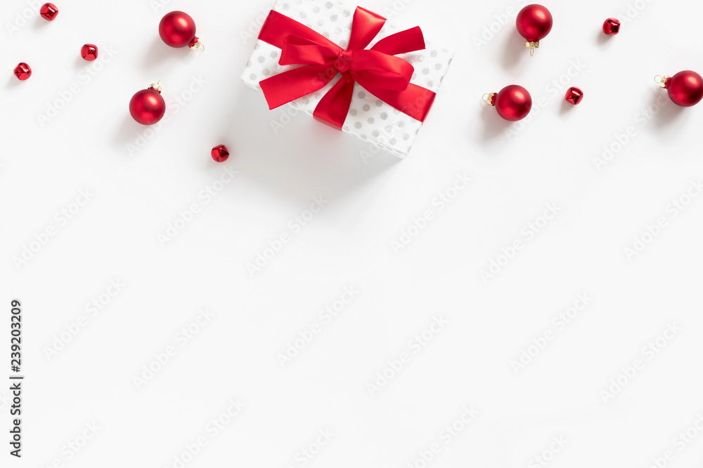 Christmas trendy composition. Xmas red and white decorations on white background. Christmas, New Year, winter concept. Flat lay, top view, copy space, banner 