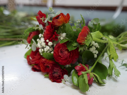 Wallpaper Mural Red roses bouquet on a table in a greenhouse Torontodigital.ca