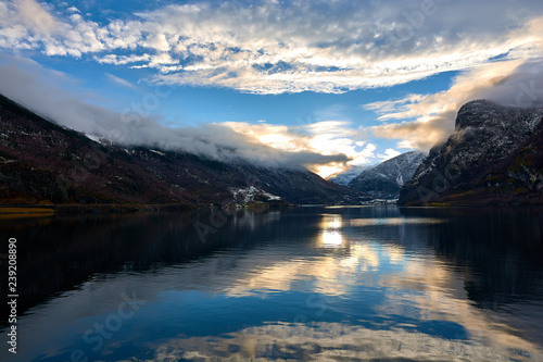 N  r  y fjord in Norway. Landscape of mountains and transparent waters. Spectacular reflections. Dream voyages
