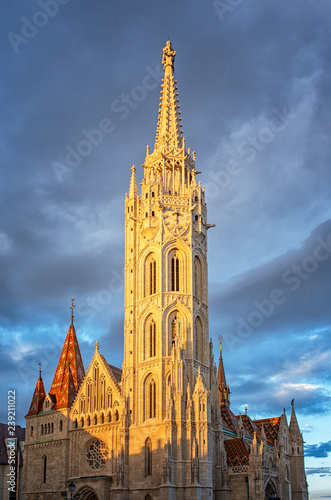 Towerbell of St Matthias church in Budapest in sunset photo