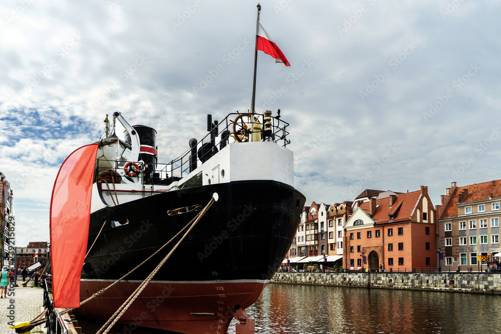 Photo in the city of Gdansk, Poland with the stern of the old merchant ship 