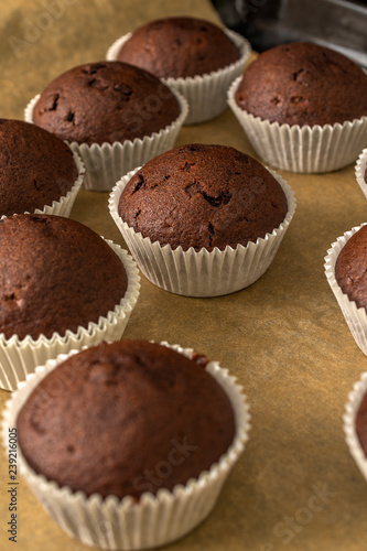 Sweet chocolate muffins with pieces of chocolate.