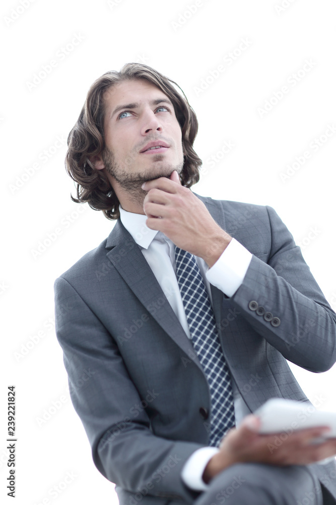 modern businessman with tablet looking at copy space modern businessman with tablet looking at copy space