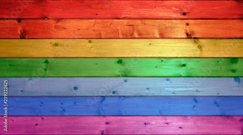 Wooden texture from boards as design element. Colors of rainbow on board photo