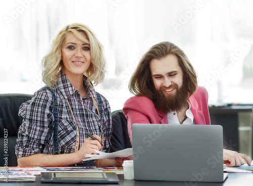 group of designers discussing new ideas in a modern Studio