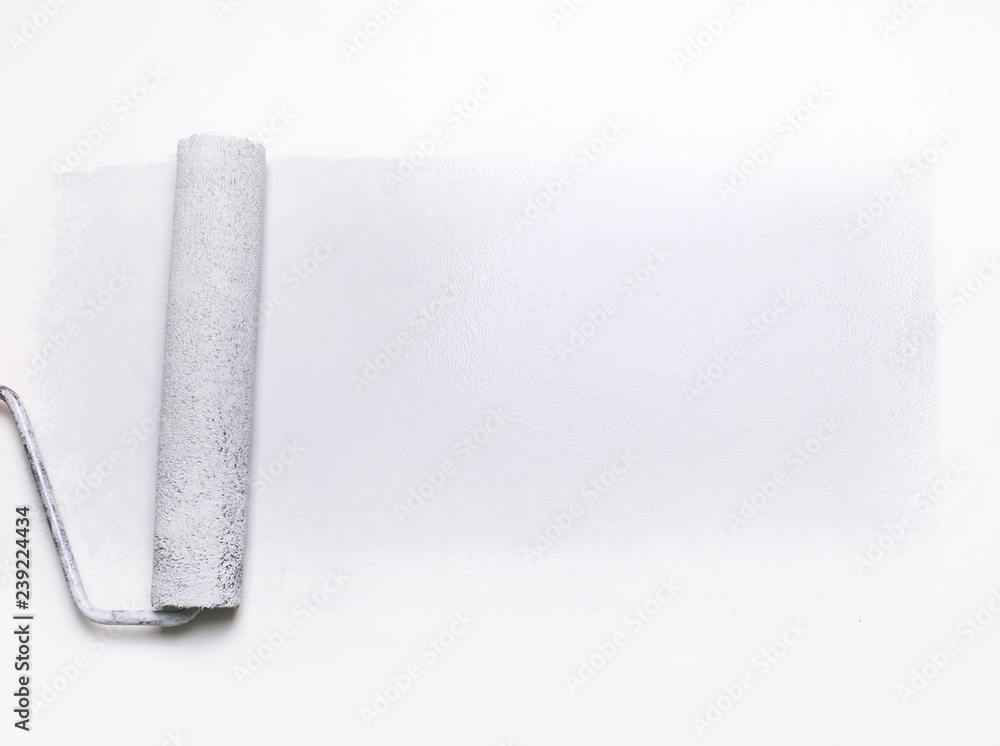 paint roller on white background. business background. photo with copy space paint roller on white background. business background. photo with copy space