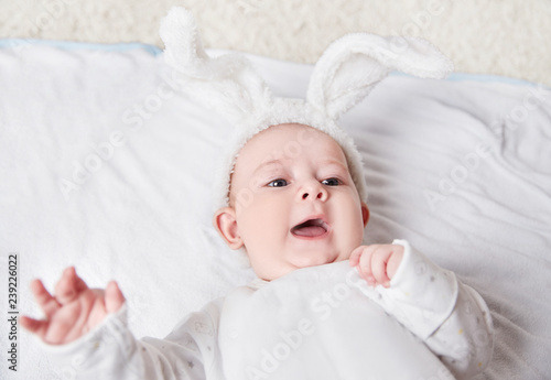 close up. smiling baby in a rabbit suit .
