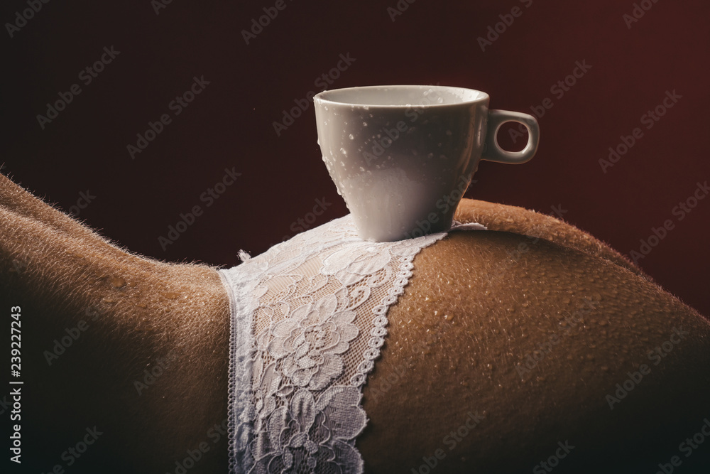Sexy coffee. A cup of coffee on the bare female buttocks. Sexy ass. A young  girl drinks coffee. Morning Stock Photo | Adobe Stock