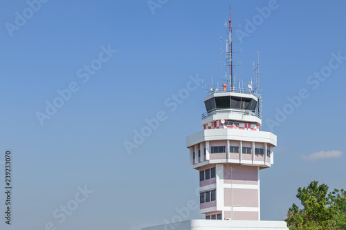 Air traffic services authority control center room in international airport under blue sky.                                                           