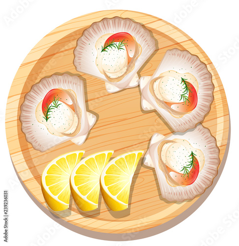 Isolated scallop on wooden plate