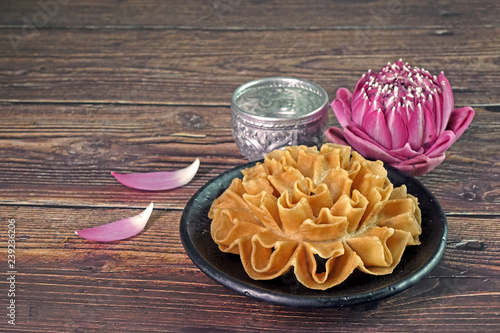 Thai food / Thai snacks: Crispy lotus Blossom Cookie (or Knanom Dok Jog / Dok Jok)  One of most famous Thai snacks. Copy space. photo