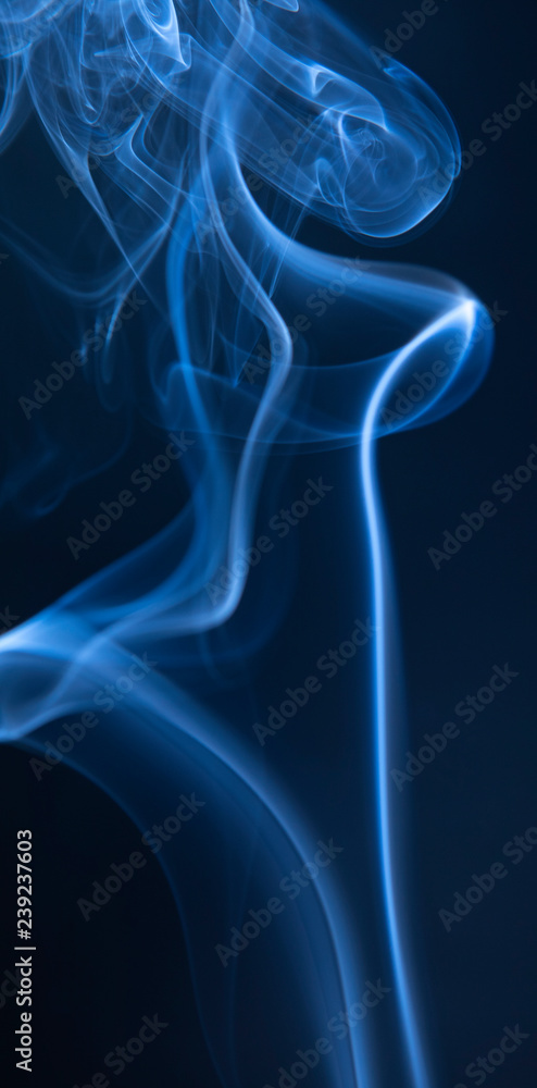 Naklejka premium Abstract blue smoke swirls