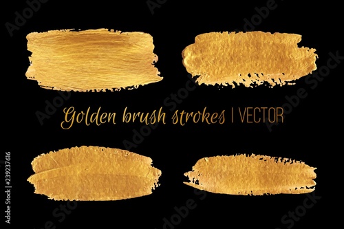 Golden paint brush strokes set. Vector design