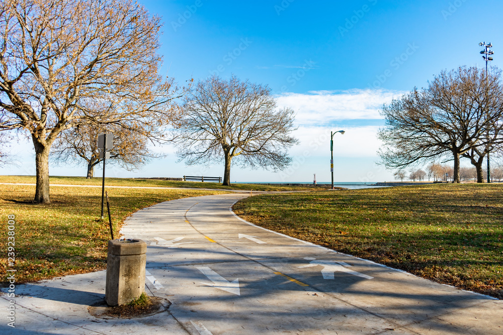 Chicago Lakefront Trail with a Drinking Fountain during Autumn with Bare Trees